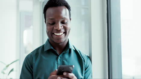 Phone,-smile-and-a-business-black-man-laughing