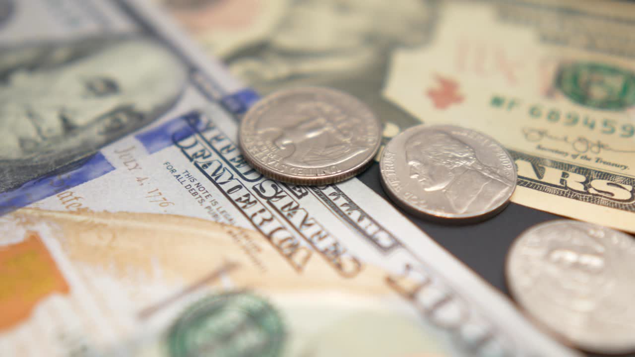 Dollar bills. Cash money banknotes and coins. Franklin's face texture. Finance and investment concept. Closeup shot. Currency exchange of one hundred usd. Rich business economy of usa