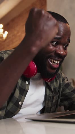 man working and celebrating success