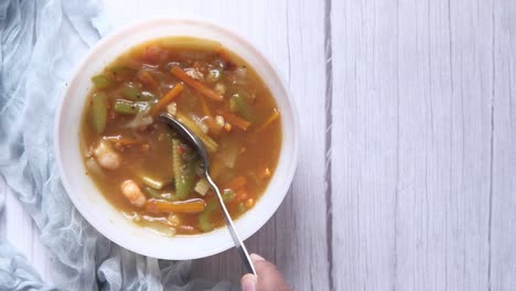 shrimp vegetable soup in a bowl