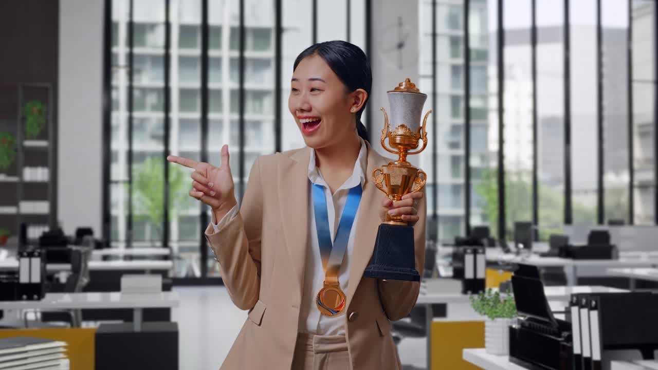 Woman Celebrating Achievement in Office