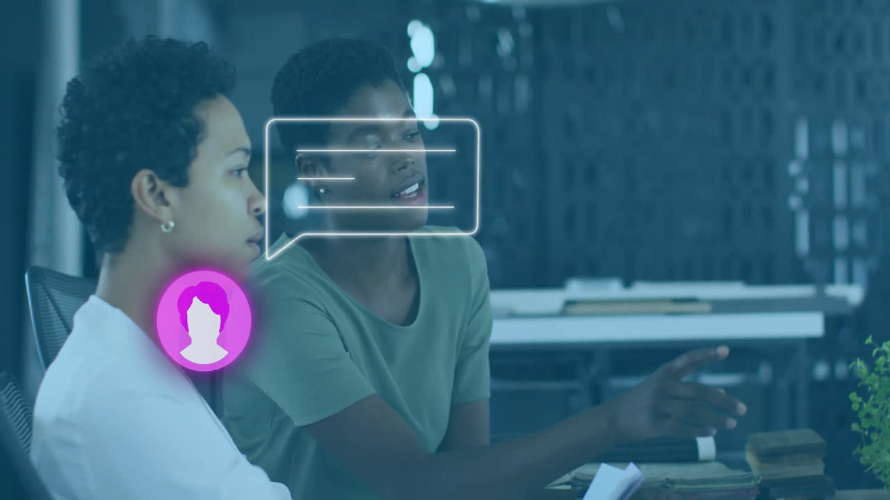 Discussing in office, two people with digital chat and profile icons overlay