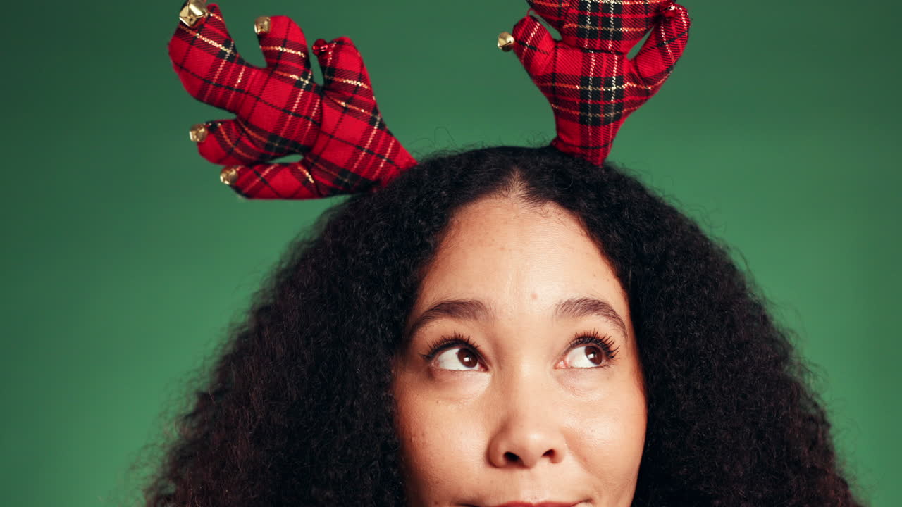Festive woman with reindeer antlers