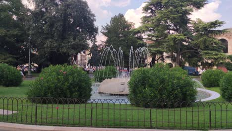 park with fountain in the center of bra square in verona, italy 3