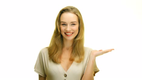 A-close-up-of-a-woman-holding-her-hand-up,-palm-face-up,-on-a-seamless-white-studio-background