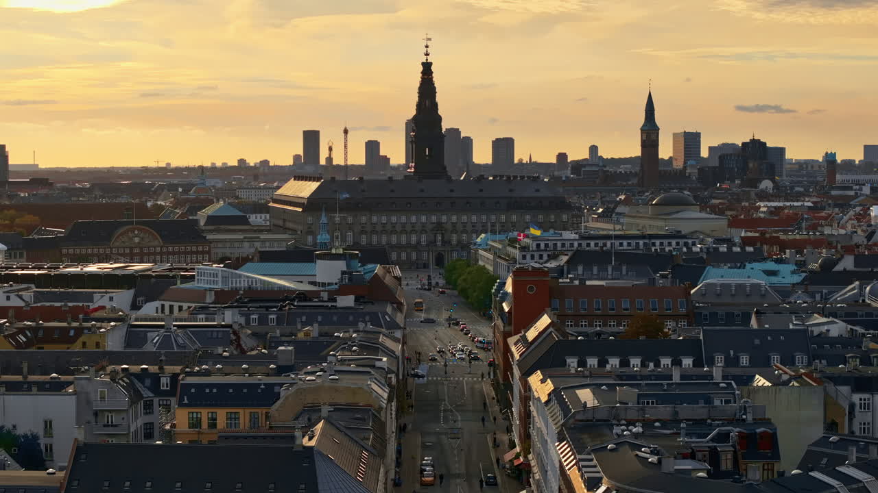 Aerial drone view of the Christiansborg Palace on the islet of Slotsholmen in central Copenhagen, Denmark at sunset
