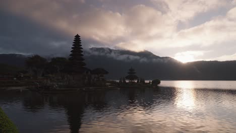 scenic view of pura ulun danu beratan temple on lake bratan at sunrise in bali, indonesia