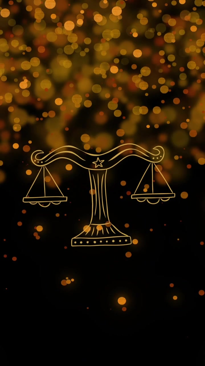 Animazione di una bilancia del segno zodiacale della Bilancia su bagliori di lente gialli illuminati