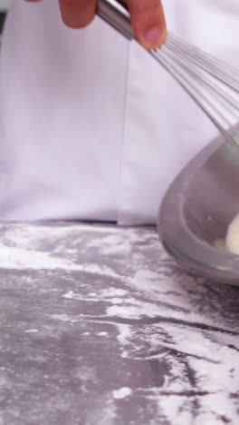 two chefs preparing a pie