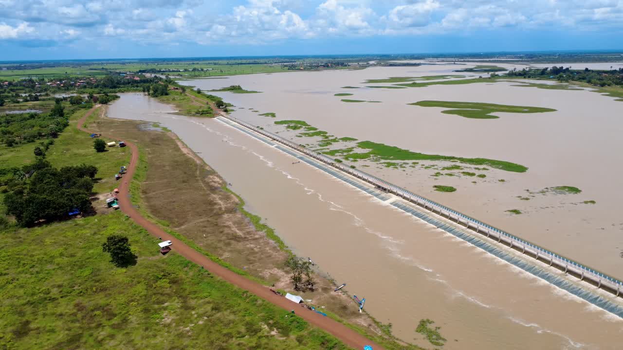 River polluted water dumping chemical waste fast fashion industry Cambodia, aerial drone