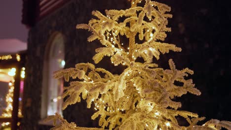 frozen christmas in santa claus house in rovaniemi at night with lights