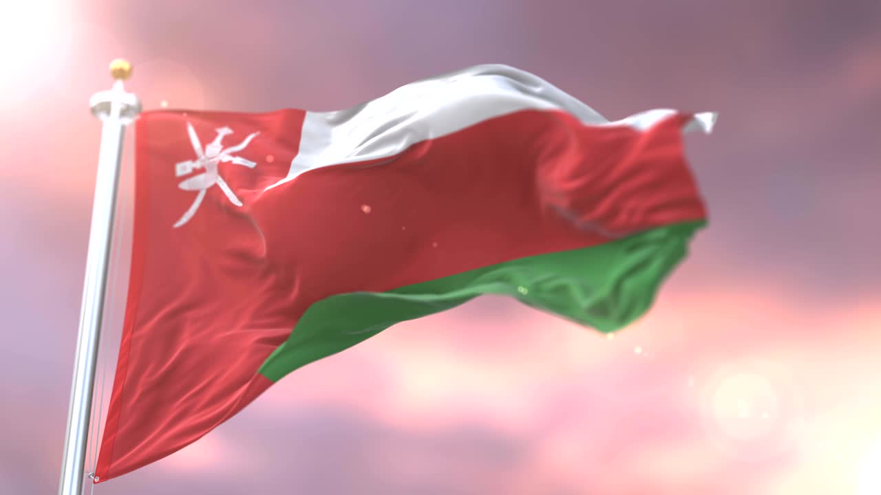 Oman flag waving at wind at sunset in slow, loop