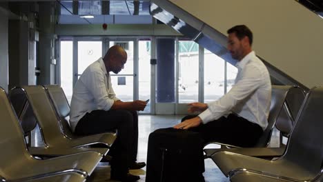 Passengers-sitting-in-waiting-area