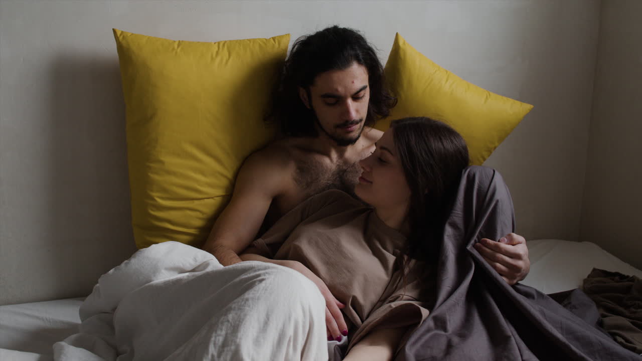 Couple in love in bed