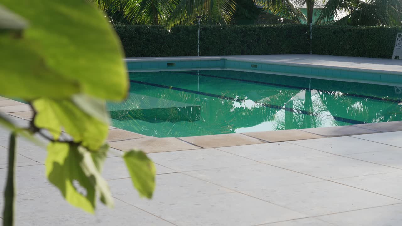 Holiday rental outdoor empty pool in a tropical destination, facility clear water