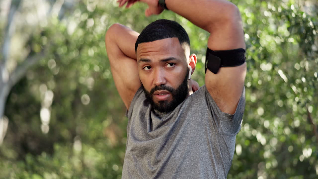 Runner man, stretching arms