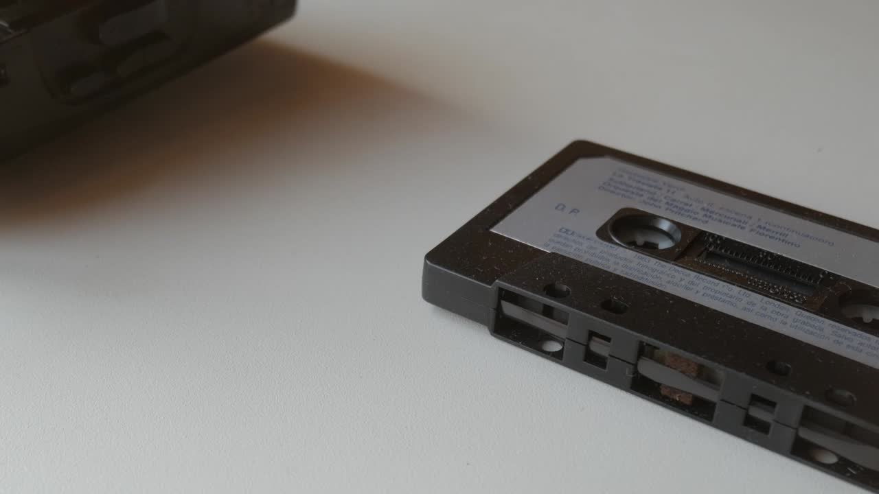 Vintage cassette tape and Walkman, nostalgic tech close-up view of the device