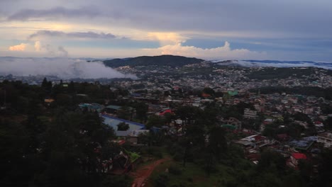 downtown city view with dramatic cloudy sky at evening from mountain top video is taken at shillong meghalaya india
