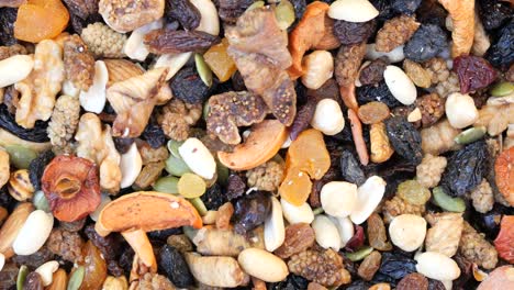 a colorful mix of nuts and dried fruits