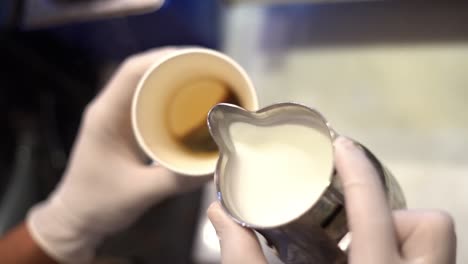 a man prepares his drink, high angle shot, close up shot, insert shot
