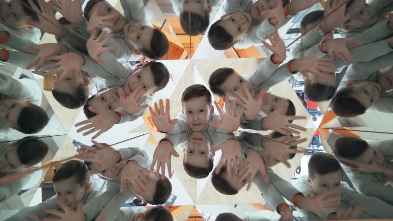 Child in a kaleidoscope tunnel. Glance into infinity