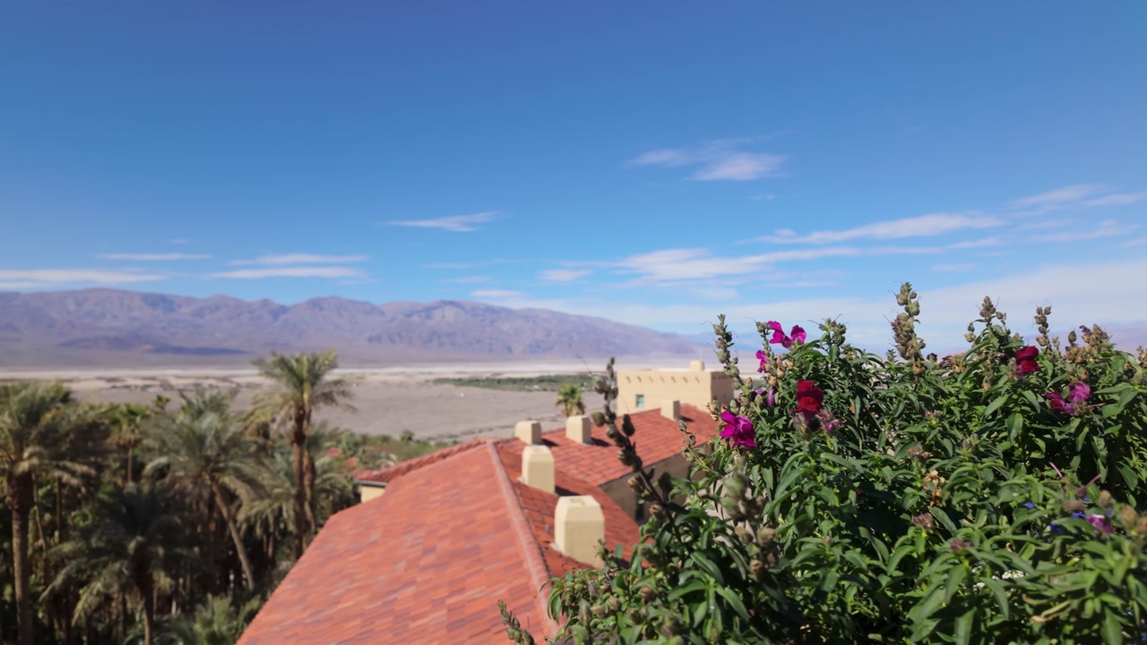 Gimbal wide panning shot of Furnace Creek from the rooftop of The Inn at Death Valley in Southern California. 4K