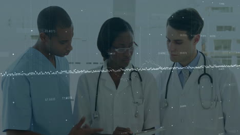 discussing data, medical professionals using digital analytics in hospital setting