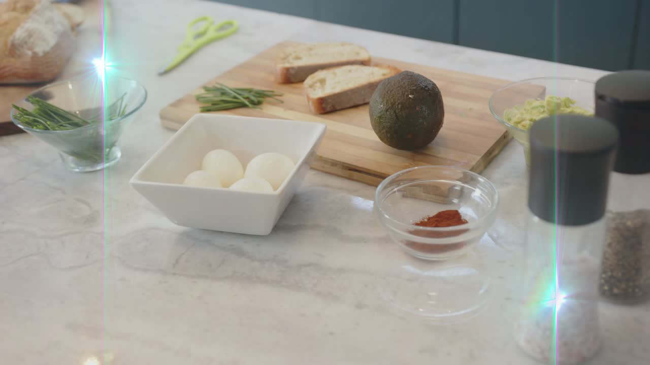 White square bowl holding four boiled eggs staying central while camera drifting, highlighting prep