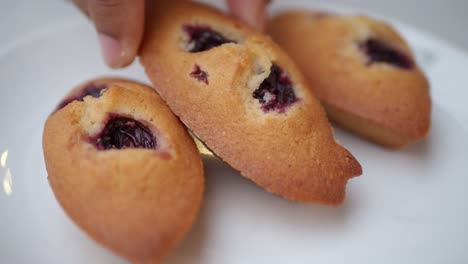 close up of three delicious cherry almond pastries