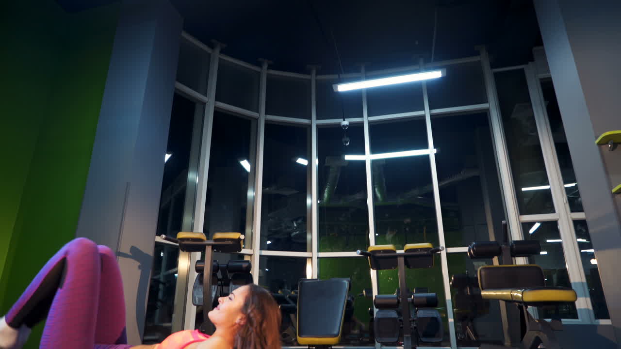 Freedom, health and yoga concept. Flexible girl doing yoga asanas in the gym