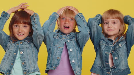 surprised little children sisters siblings shocked by sudden victory game winning good news