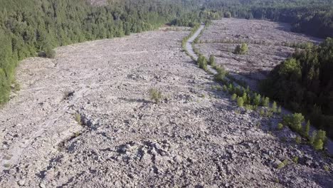 highway cuts through nisga'a memorial lava bed volcanic debris, aerial