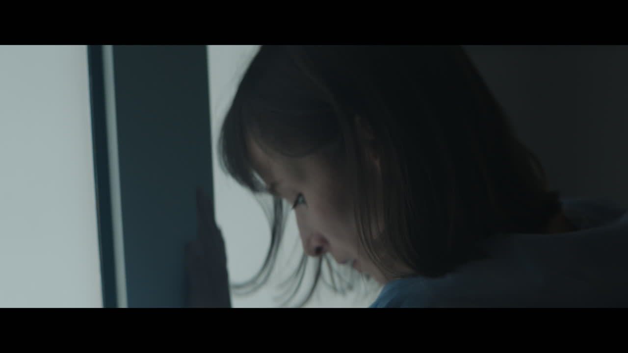 A girl runs through strange corridors of abandoned hospital