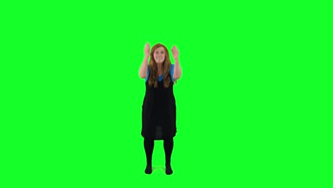 Teacher-jumping-in-front-of-the-green-screen