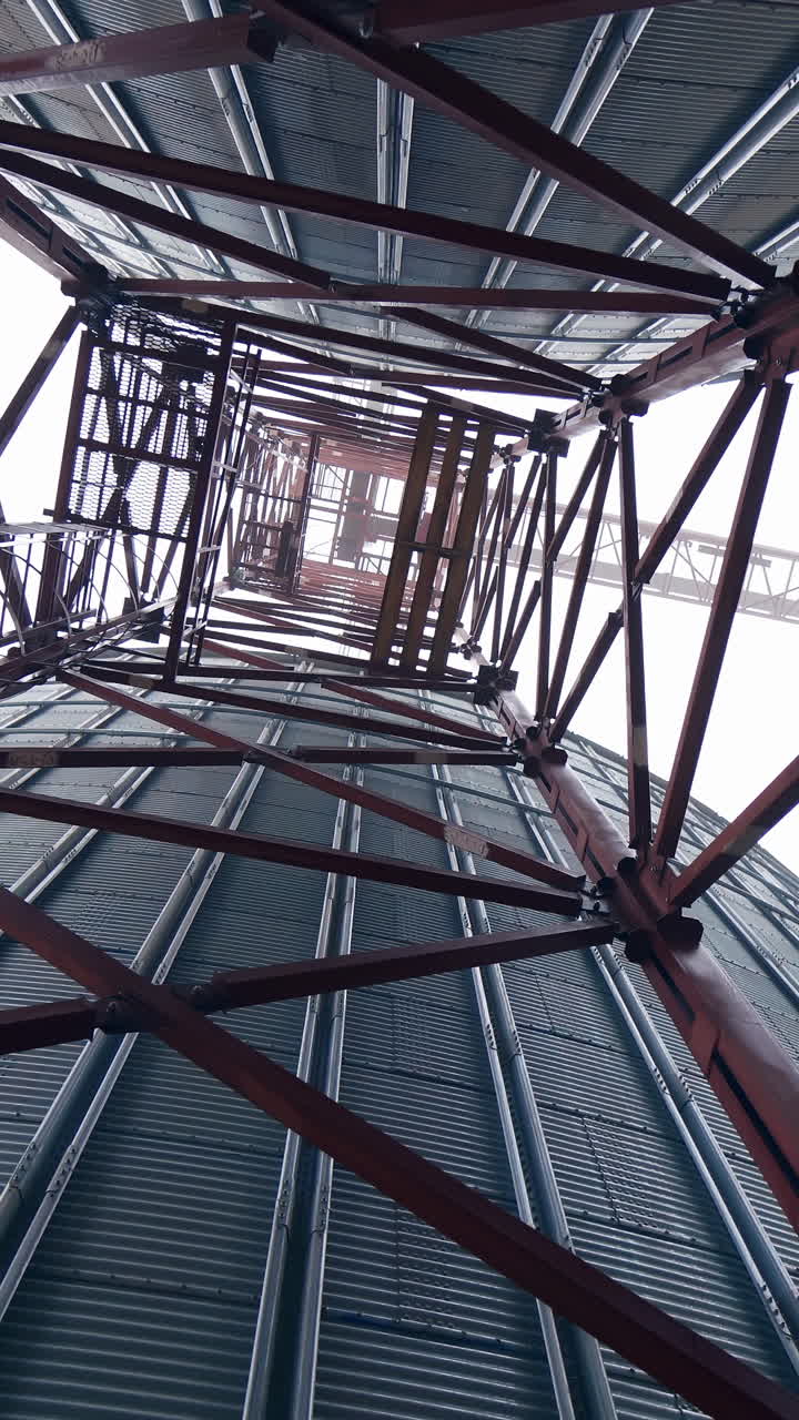 Large metal tanks for grain. Silver containers storing agriculture crop