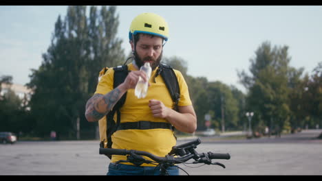 delivery person taking a drink