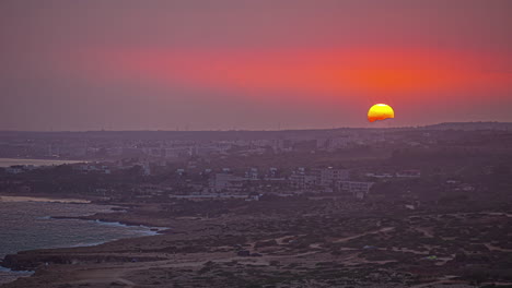 sunset over ayia napa, a mediterranean resort town on the southeast coast of cyprus - time lapse