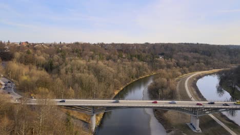 drone shows traffic on a bridge over the river