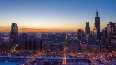 urban skyline of chicago at winter sunset. blue hour. aerial view. usa