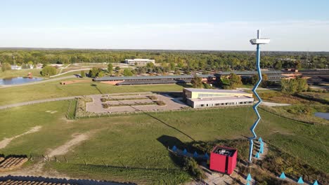 tower and old farm buildings in michigan, aerial drone view