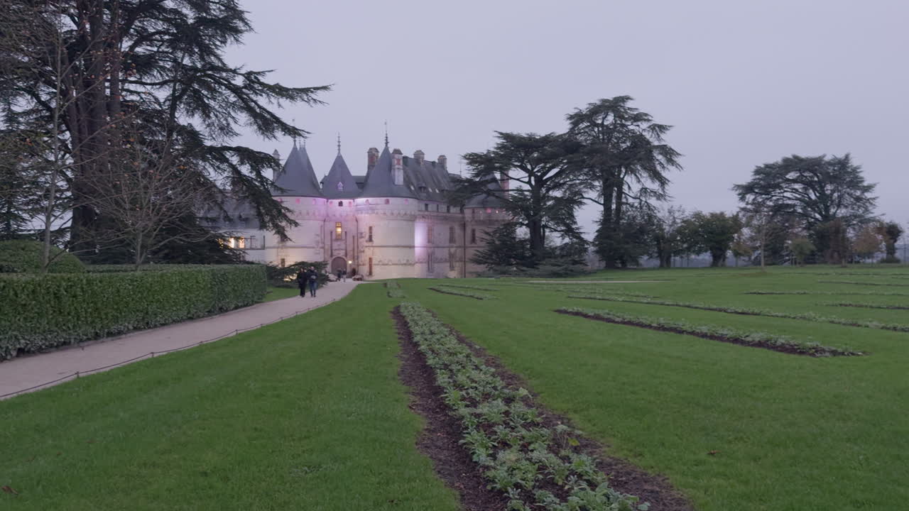 Chateau at Dusk: A Stroll Through the Gardens