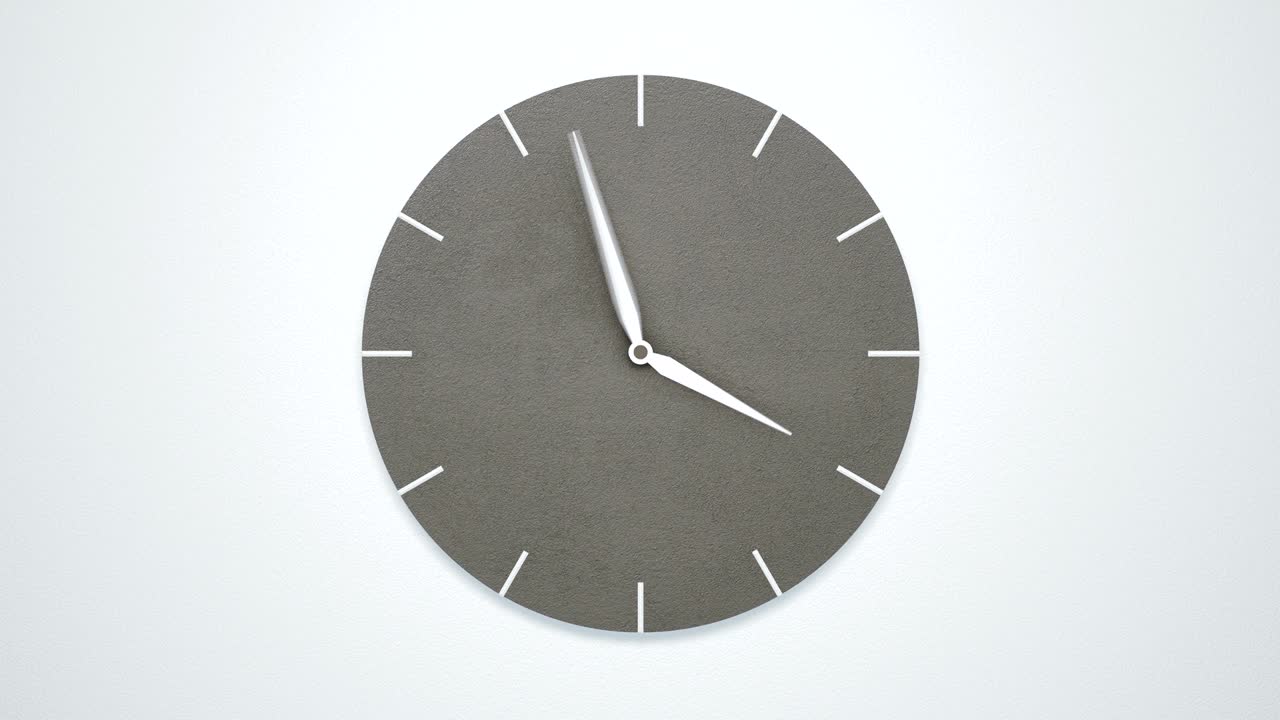el lapso de tiempo del reloj de hormigón minimalista moderno en la pared blanca.