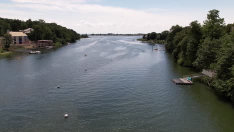 an aerial timelapse of the saugatuck river in connecticut on a sunny day