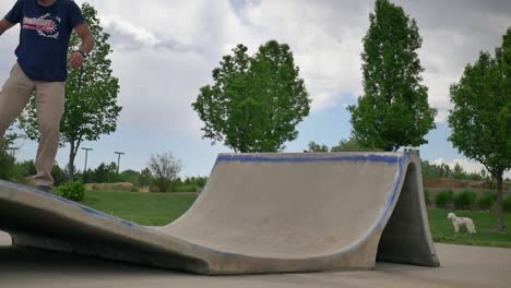 skateboarder-does-a-nose-pick-nollie-flip-on-a-quarter-pipe-at-the-skatepark