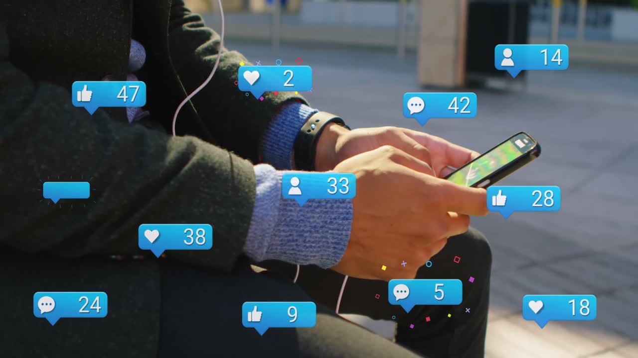 Animation of social media icons falling over person using smartphone