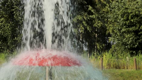 red fountain in the public park