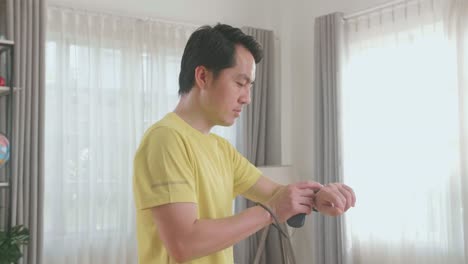 man checking time in the living room