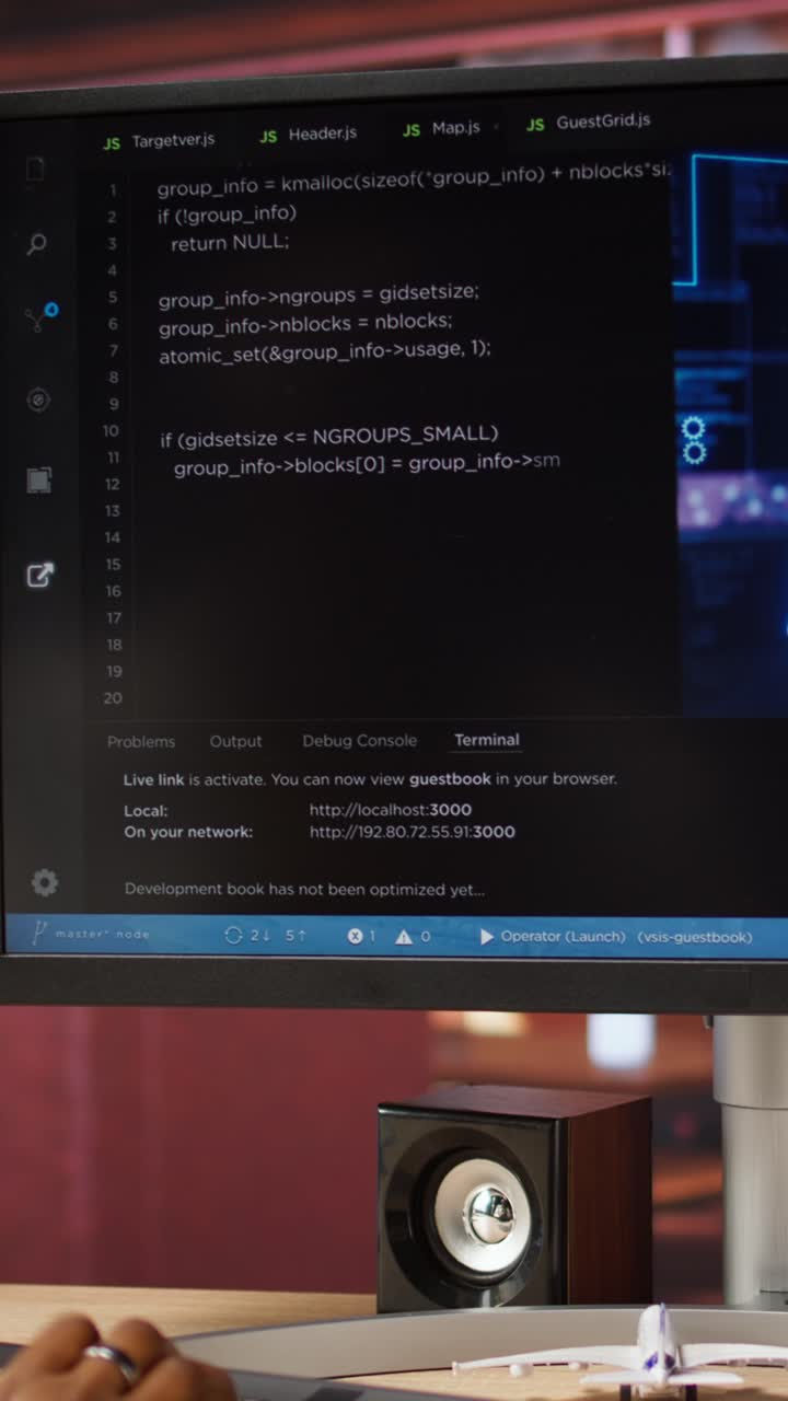 Vertical video IT engineer drinking coffee, using computer at home for AI computing