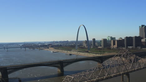 st louis arch aerial with bridges over mississippi river