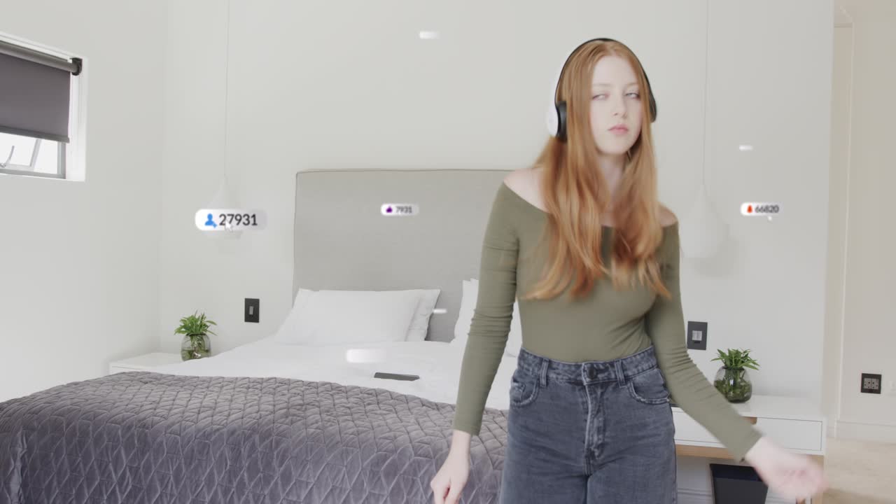 Woman with headphones tapping phone, dancing for fans as social media badges floating around her